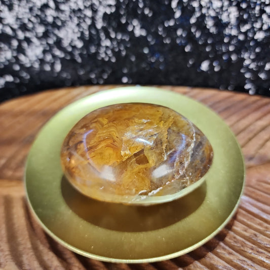 Golden Healer Palmstone - MagicBox Crystals